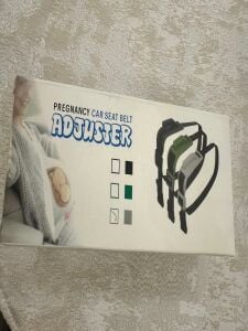 Pregnancy car seat belt adjuster