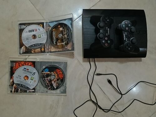 PS3 with 2 Controllers, 4 Games