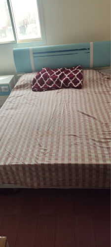 cupboard , bed , table , mattresses