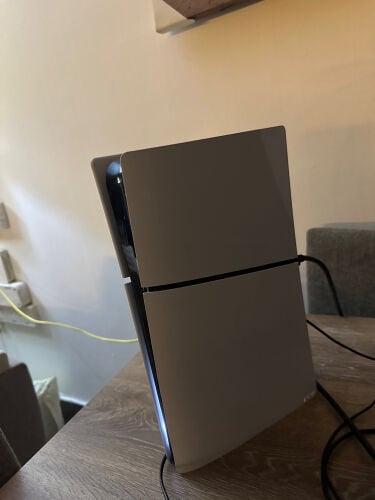 PlayStation 5 and laptop 