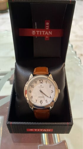 Unused Titan watch with box 