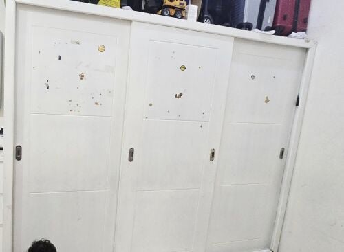 bed with metress and cupboard