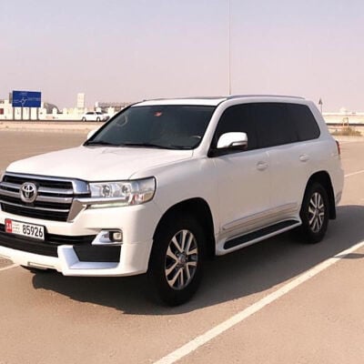 I need a clean, white Land Cruiser