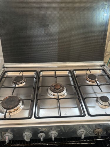 Gas stove with electric oven in exc