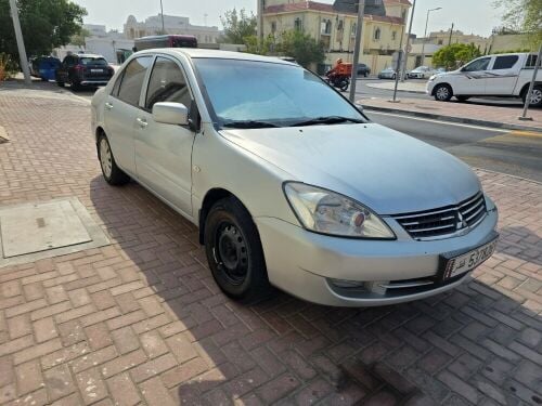 2013 Mitsubishi Lancer in excellent condition, very clean inside and out. No maintenance required. Registration valid for seven months. Air conditioning in excellent working order. Mileage 279,000 km. Buy now and enjoy a smooth, fuel-efficient drive.