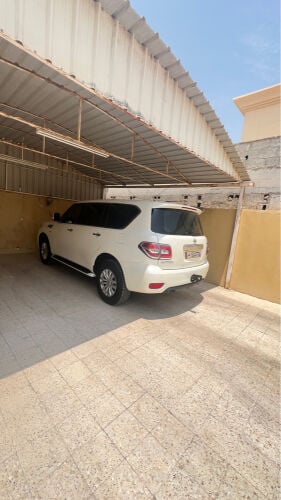مالك اول نيسان باترول ابيض لؤلؤي 