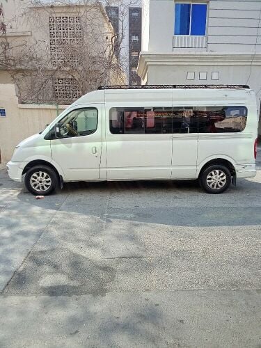 15-seater bus for rent with driver
