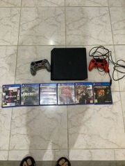 ps4 with cds and 2 controllers 