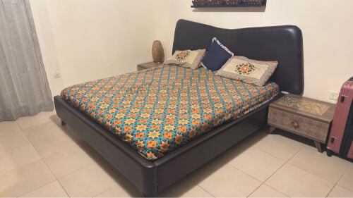 bet set with mattress and side tabl