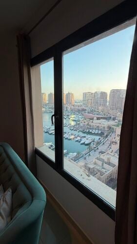 Apartment in The Pearl with a marin