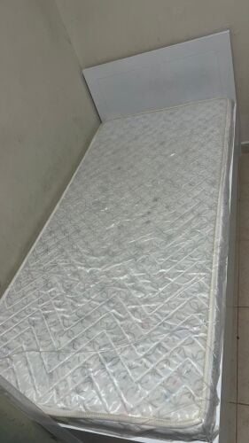 single bed with the mattress