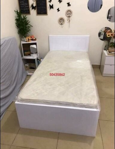 single bed wooden with mattress