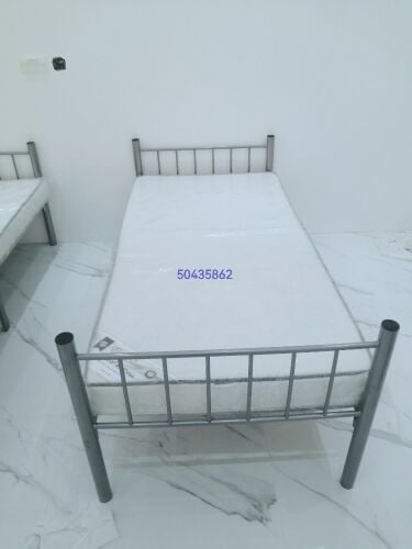 single bed with mattress<