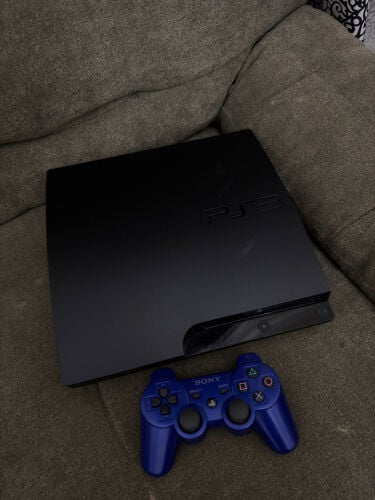 PS3 slim with 25 games 1 controlle