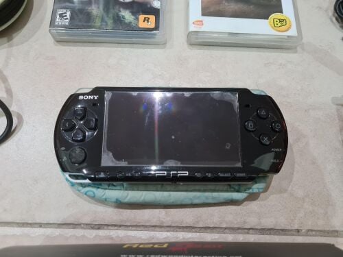 PLAYSTATION PSP WITH GAMES