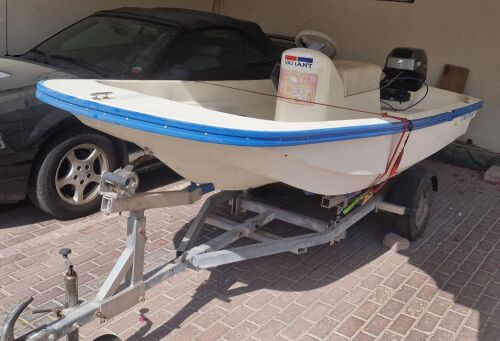 Boat with trailer and engine