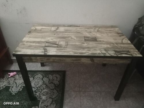 Two dining tables with chairs