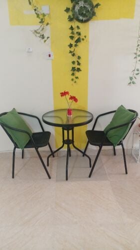 tables, chairs, artificial flowers