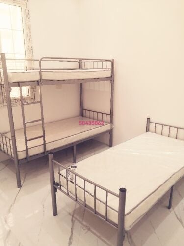 Steel double bunk and single.