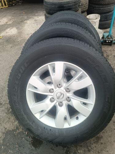 265/70/18" rim