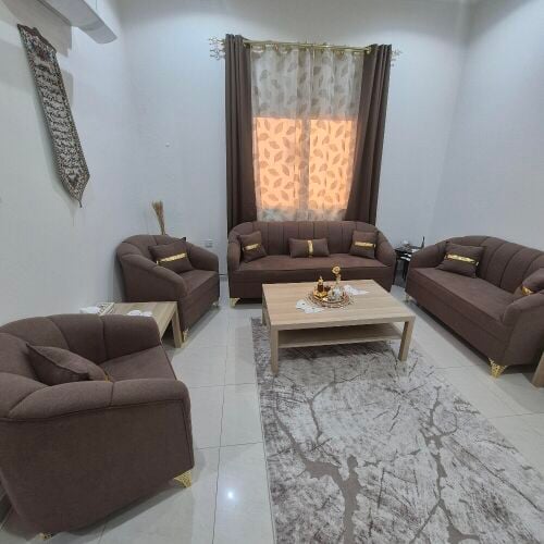 Sofa set with carpet,tables,curtain