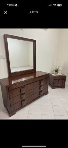 dresser with drawers and mirror