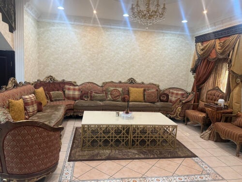 ‏sofa with all of the things 