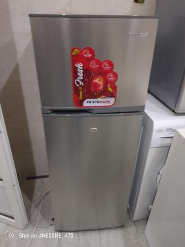 almost new condation fridge for sel
