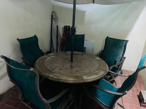 There are total five chairs, one dining table and one umbrella, it is in good condition.