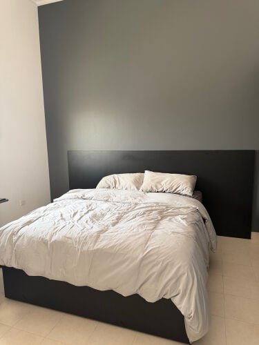 Black bed and closet