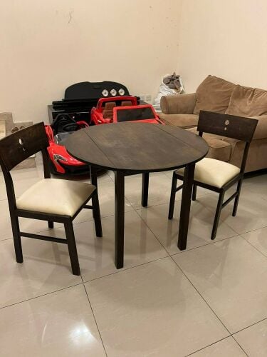 Table with 2 chairs QR 250 only.