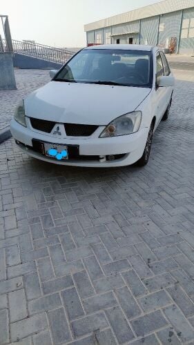 Mitsubishi Lancer GLX 2010 model.