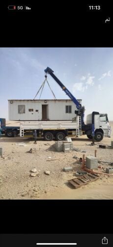 10 TAN BOOM TRUCK CRAIN FOR RENT UN