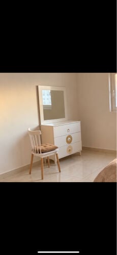 Double bed with a vanity table