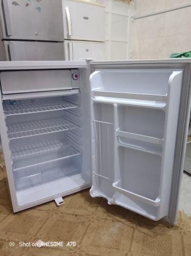 mini size fridge for sell.