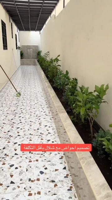 تنفيذ حواض زراعة الأشجار مع شلال