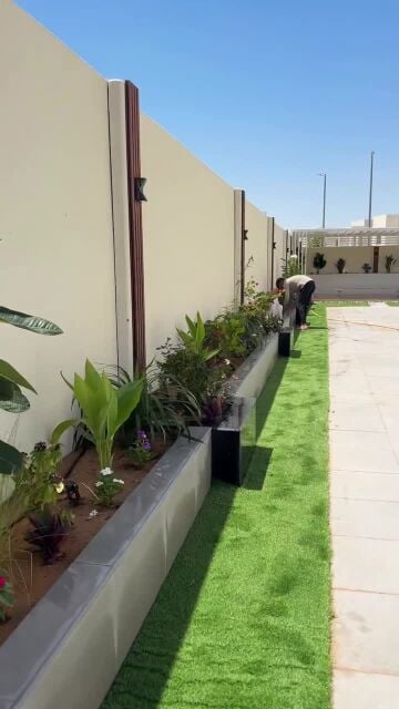 تنسيق حواض زراعة وتنفيذه نافورة