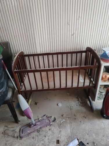 Rocking wood bed